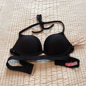 Black Victoria’s Secret bikini top. NWT